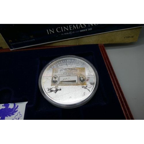 7239 - A Titanic four coin commemorative set, cased and with paperwork