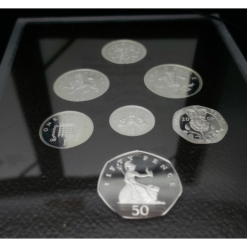 7240 - A 2008 UK Coinage Royal Shield of Arms silver proof collection, and a 2008 UK Coinage Emblems of Bri... 