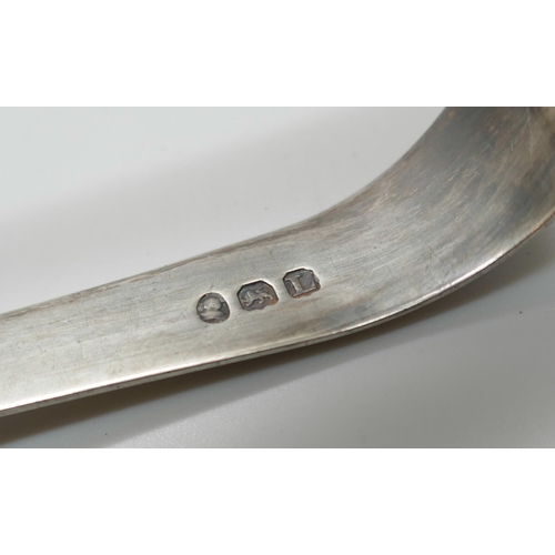 7247 - A silver backed mirror, a silver bangle, a silver salt spoon, a pair of silver sugar bows and a Geor... 