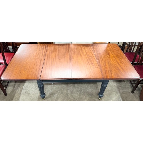 215 - A Victorian mahogany and charcoal painted extending dining table