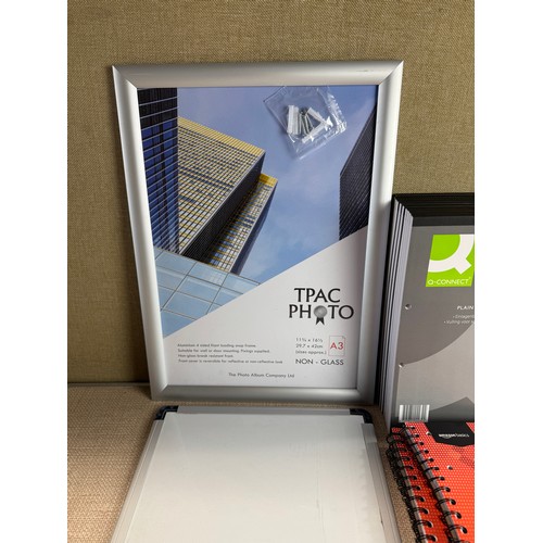 6094 - Various A4/A5 notepads, a whiteboard and an A3 non-glass photo frame *This lot is subject to VAT
