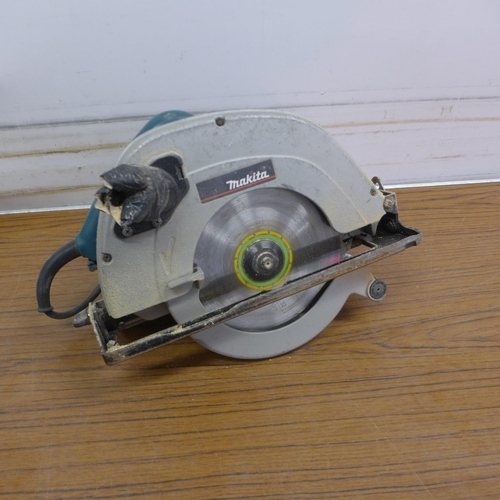 5015 - A Makita 5704R 110v circular saw - in case