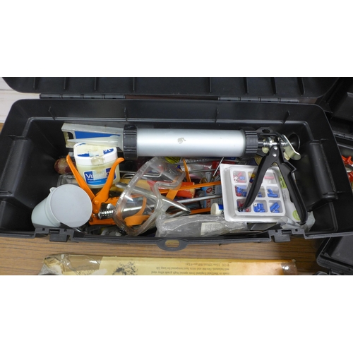 5019 - Three tool boxes containing various tools including players, clippers, knives and an assortment of c... 