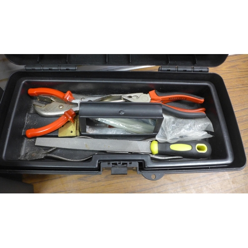 5019 - Three tool boxes containing various tools including players, clippers, knives and an assortment of c... 