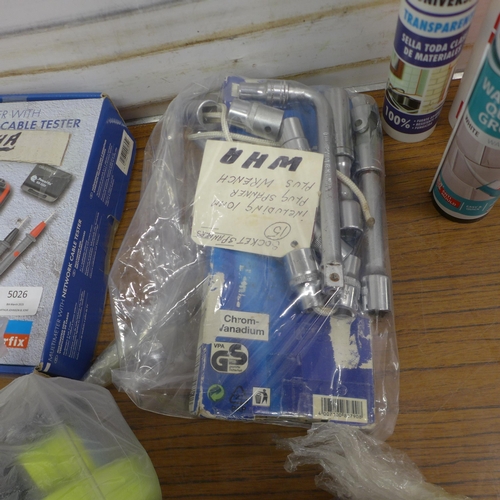 5026 - A bag of various items including coded lock, grout, silicone, security straps, sockets/spanners, net... 