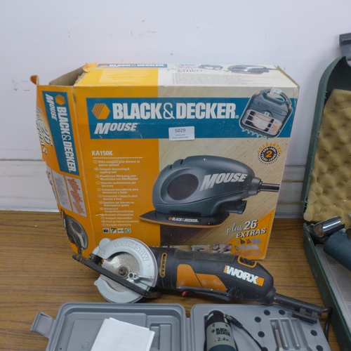 5029 - A quantity of power tools including a Worx WX423 240V saw, a Black and Decker KC9024 2.4V electric s... 