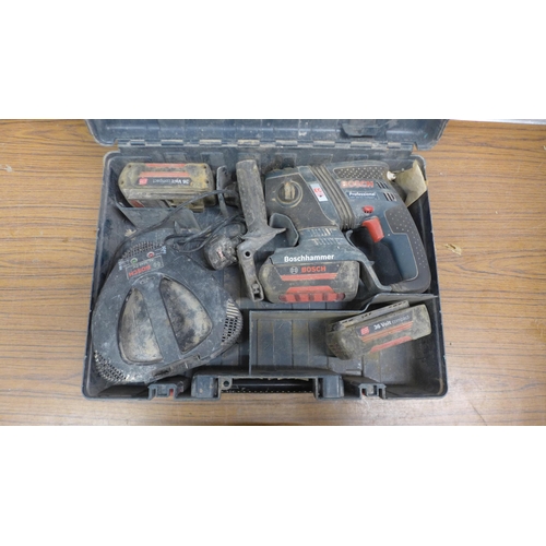 5042 - A Bosch GBH 36v-EC 36v SDS hammer drill with three 36v batteries and a Bosch batteru charger (Charge... 