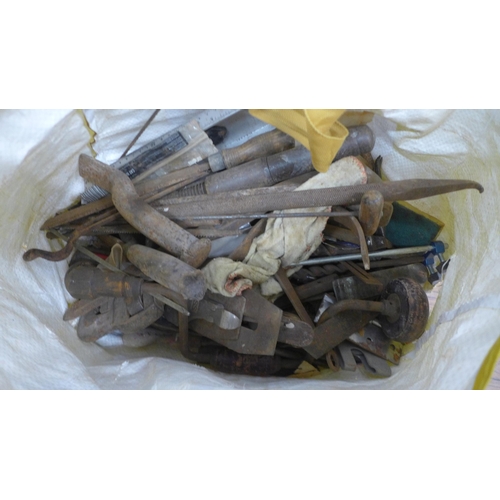 5048 - A bag of various tools including files, brace drill, spiri level, a Record SS no.6 plane, etc