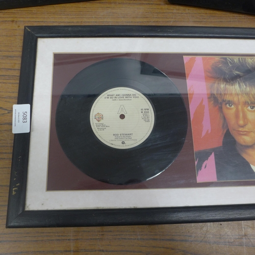 5083 - Three framed Rod Stewart photographs, two with discs (