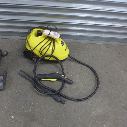 5140 - A Dyson DC25 upright Vacuum cleaner and a Karcher SC1.020 pressure washer