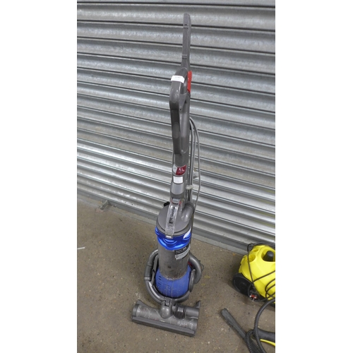 5140 - A Dyson DC25 upright Vacuum cleaner and a Karcher SC1.020 pressure washer