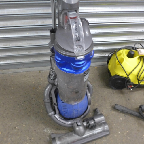 5140 - A Dyson DC25 upright Vacuum cleaner and a Karcher SC1.020 pressure washer