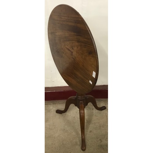 190 - A George III mahogany tilt top tripod wine table