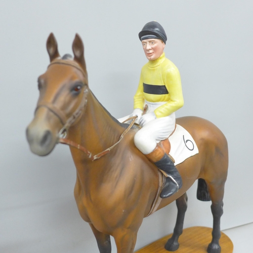 2001 - A Beswick model of a racehorse, Arkle, with Pat Taffe Up, mounted on a wooden plinth