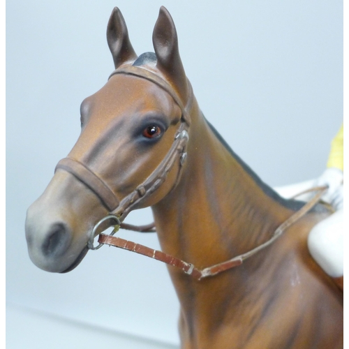 2001 - A Beswick model of a racehorse, Arkle, with Pat Taffe Up, mounted on a wooden plinth