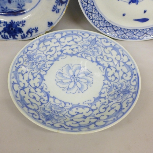 2007 - A Qing Dynasty blue and white porcelain plate, two other blue and white porcelain plates, one depict... 