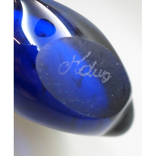 2010 - A fish shaped Mdina glass vase with mottled translucent pink core covered with transparent blue wing... 