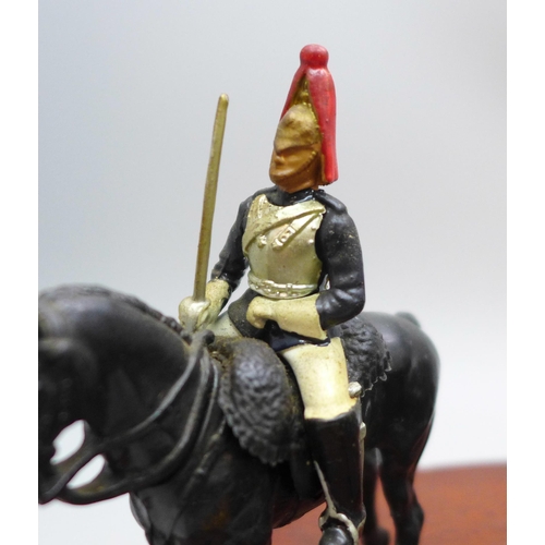 2017 - A William Britain HM the Queen, Mounted Horseguard and Lifeguard set, on wooden plinth, boxed