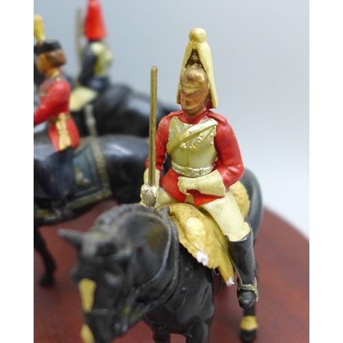 2017 - A William Britain HM the Queen, Mounted Horseguard and Lifeguard set, on wooden plinth, boxed