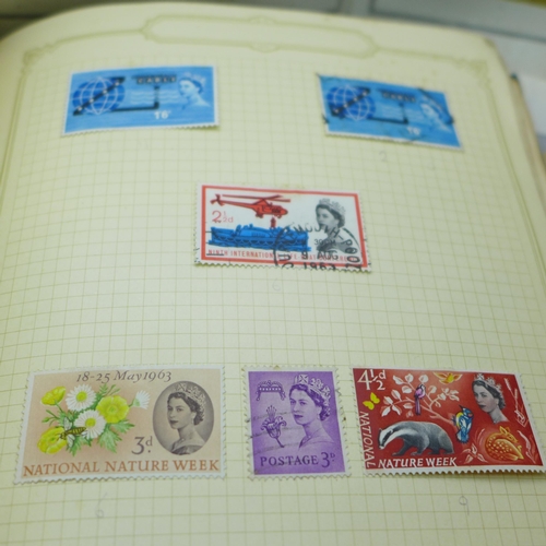 2030 - A collection of stamps in three small albums