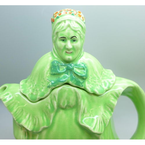 2033 - An Old Woman In Shoe teapot, Lingard Webster in green and silver and a Little Old Lady teapot in gre... 