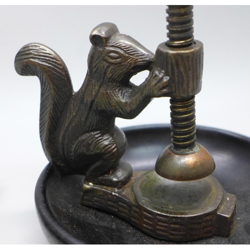 2036 - A novelty squirrel nutcracker and a novelty Chinese bronze tortoise lock