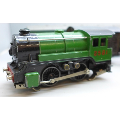 2051 - A Hornby 00 gauge coach, TTR 3-Plank wagon, LMS, boxed, a TTR model locomotive with tender and six w... 