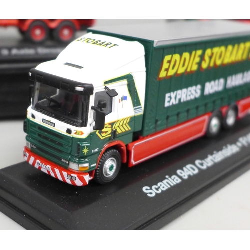 2059 - Ten Eddie Stobart Atlas Editions die-cast model vehicles and a set of flat pack display shelves