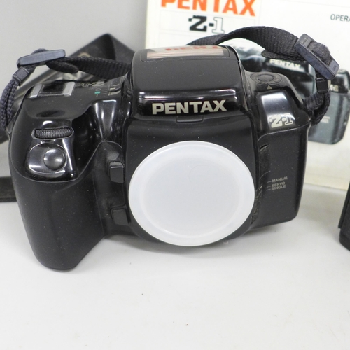 2071 - A Pentax ME Super camera body and a Pentax Z-1 camera body, both with manuals, together with a Penta... 