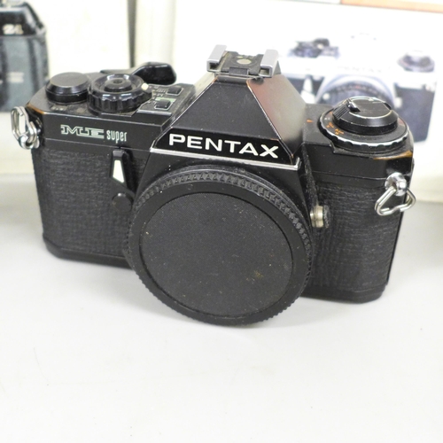 2071 - A Pentax ME Super camera body and a Pentax Z-1 camera body, both with manuals, together with a Penta... 