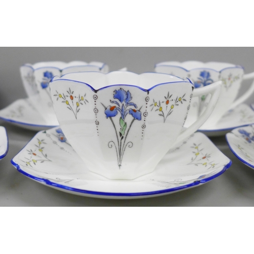 2072 - A Shelley part tea service, Art Deco design, comprising five tea cups, one with small crack, six sau... 