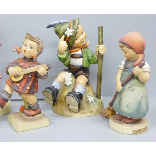 2075 - A collection of ten Goebel figures to include singing lesson, daddy's girls, apple tree boy, little ... 