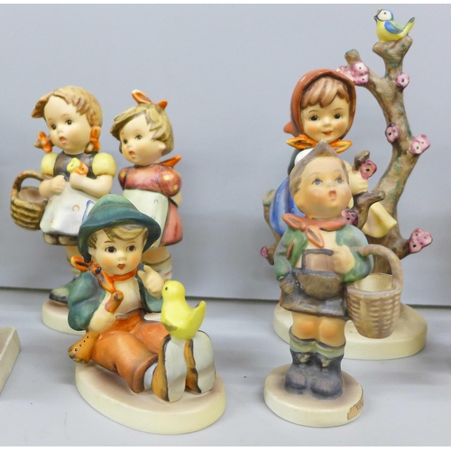 2075 - A collection of ten Goebel figures to include singing lesson, daddy's girls, apple tree boy, little ... 