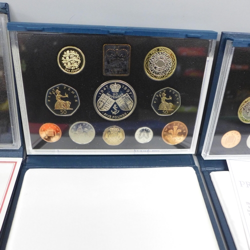 2077 - Ten Royal Mint year coin sets; four proof and six GB and Northern Ireland sets, 1970s and ‘80s