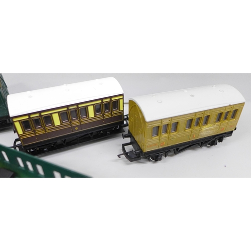 2080 - Two Hornby 00 gauge model locomotives, seven coaches, one lacking roof and a wagon