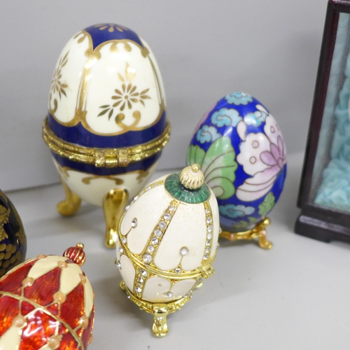 2109 - A collection of decorative egg ornaments and trinket boxes including cloisonné and Russian made