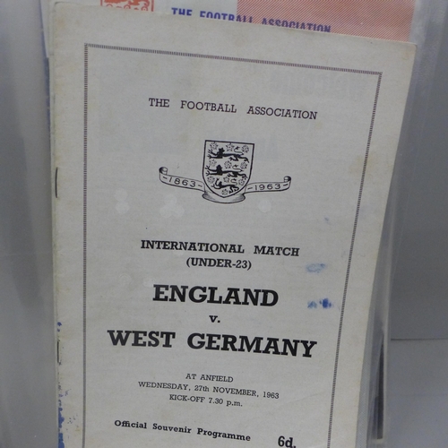 2114 - Football programmes; 1950s, 1960s, Manchester United, England U21, U23, friendlies, other programmes... 