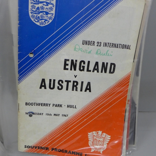 2114 - Football programmes; 1950s, 1960s, Manchester United, England U21, U23, friendlies, other programmes... 