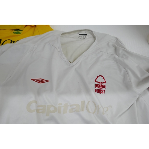 2128 - Six assorted Nottingham Forest Football Club home, away and training shirts and a pair of 1994-1996 ... 