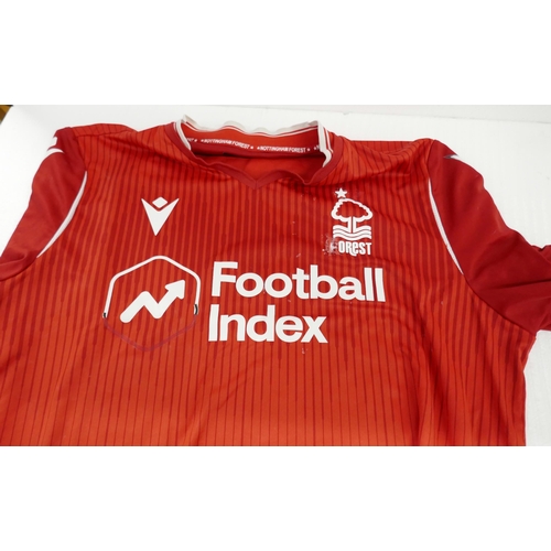 2128 - Six assorted Nottingham Forest Football Club home, away and training shirts and a pair of 1994-1996 ... 