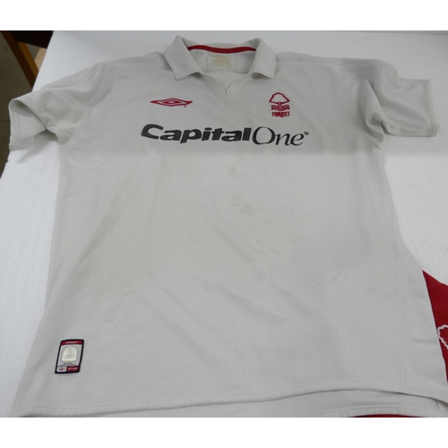 2128 - Six assorted Nottingham Forest Football Club home, away and training shirts and a pair of 1994-1996 ... 