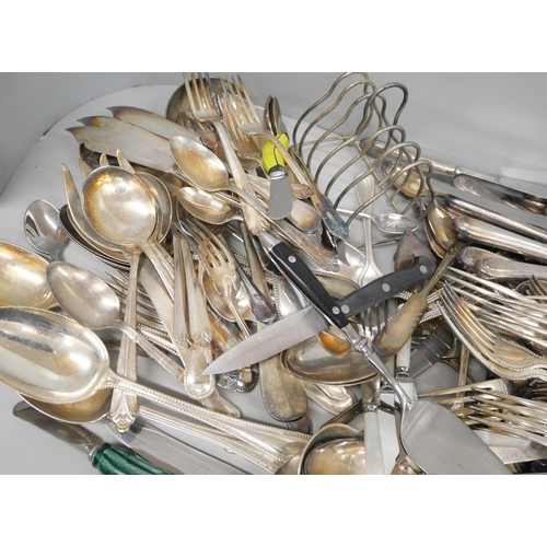 2133 - A collection of silver plated cutlery, other flatware and a toastrack