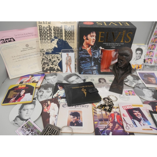 2139 - Elvis Presley, various collectables including books, a pack of photograph playing cards, a bust, etc... 