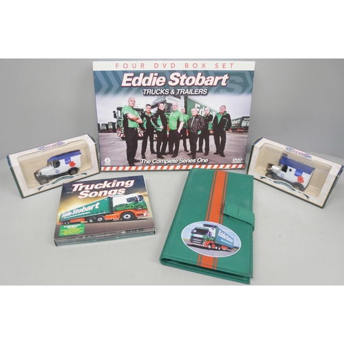 2140 - Four Eddie Stobart porcelain decorative plates, a DVD box set, two trams and a Scania low loader