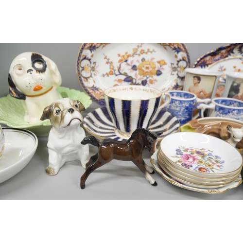 2143 - A collection of pottery including a Crown Devon dog, Crown Derby, a/f, an early cup and saucer, Worc... 