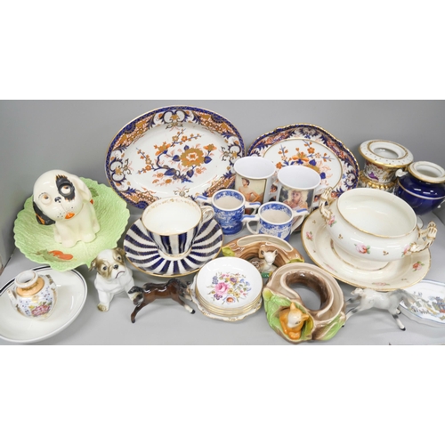 2143 - A collection of pottery including a Crown Devon dog, Crown Derby, a/f, an early cup and saucer, Worc... 