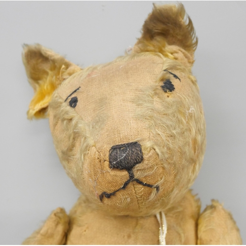 2163 - An early 20th Century Teddy Bear having stitched eyes and nose, and velvet paw pads. A/f