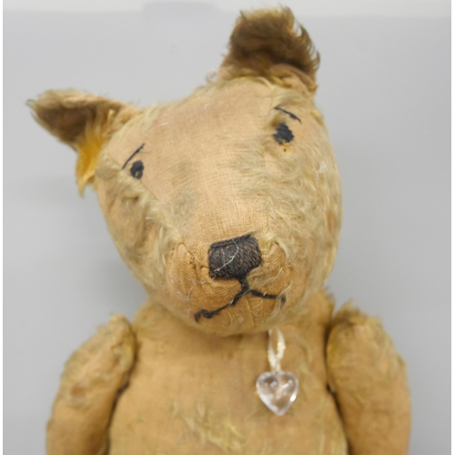 2163 - An early 20th Century Teddy Bear having stitched eyes and nose, and velvet paw pads. A/f