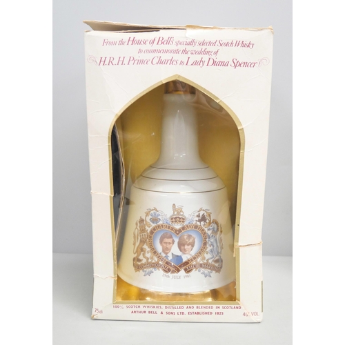 2215 - Three Bell's Scotch Whisky decanters, commemorating Wedding of Prince Charles and Lady Diana, births... 