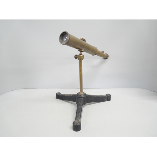 2216 - An early 20th Century Griffin and Tatlock brass rack and pinion desk telescope on tripod base stand